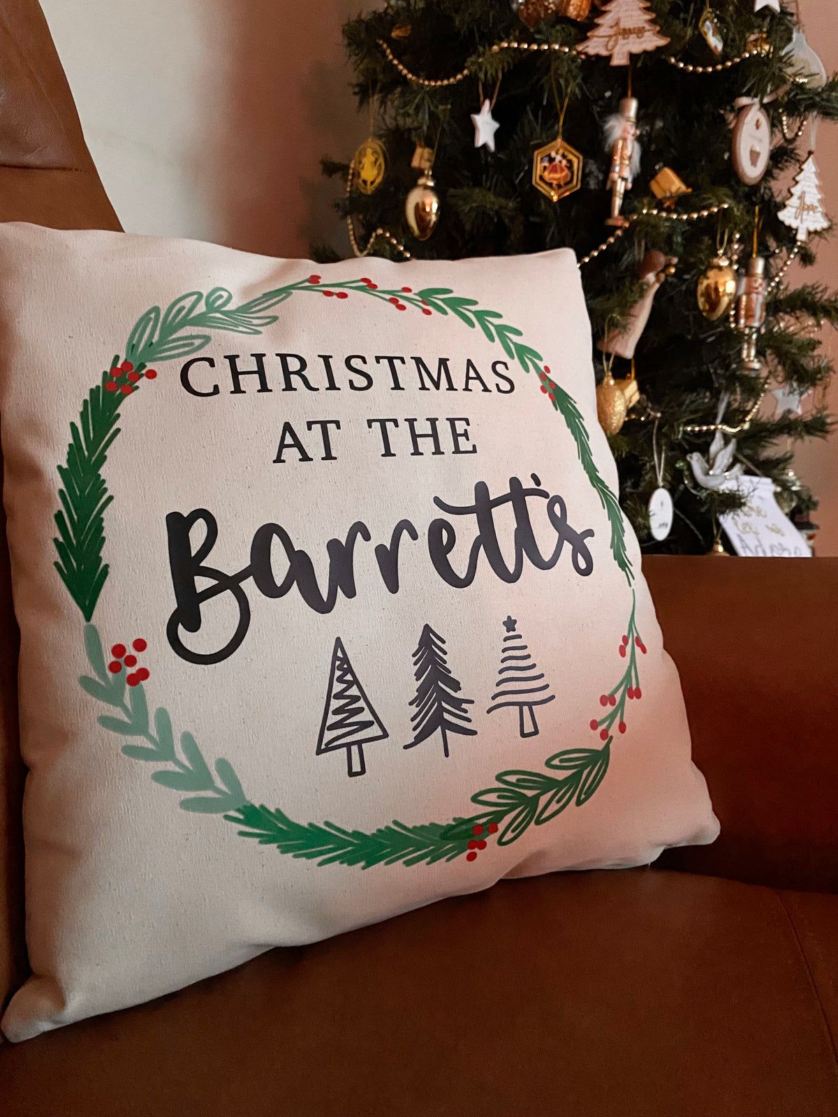 Personalised Christmas at the (Surname) Cushion – Hand Lettered Festive Wreath Design